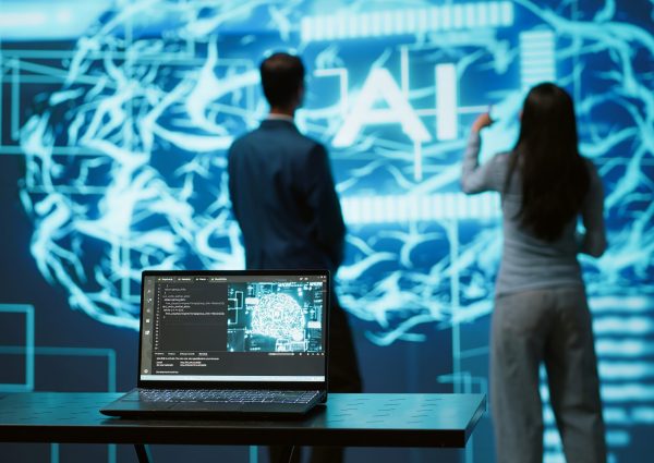 Engineers use AR tech to visualize AI neural networks brain, solving company problems. IT professionals using artificial intelligence augmented reality hologram, camera A
